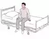 Illustration som visar person som sitter på sjukhussäng med benen över sängens långsida