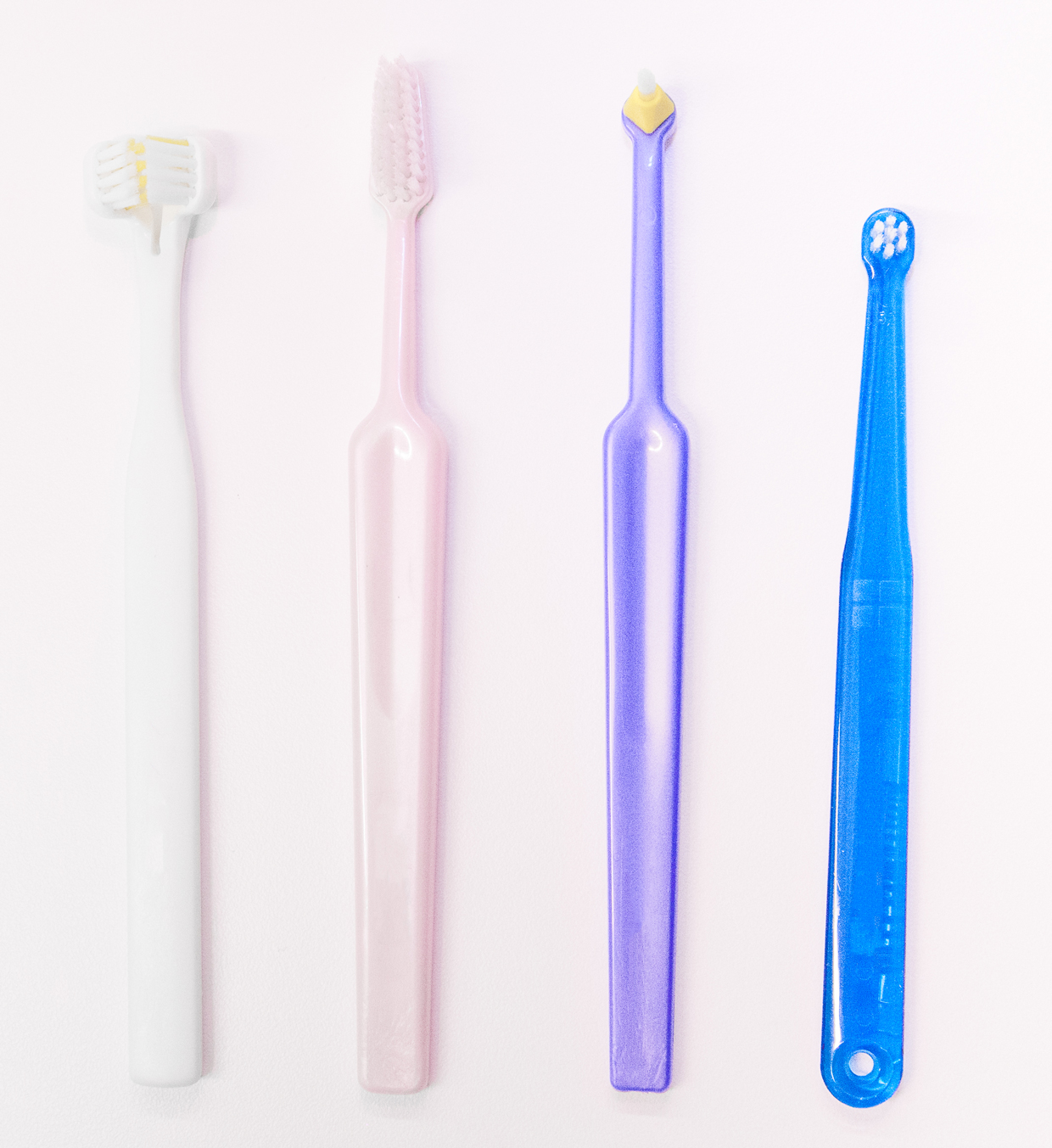 Bild som visar olika typer av tandborstar